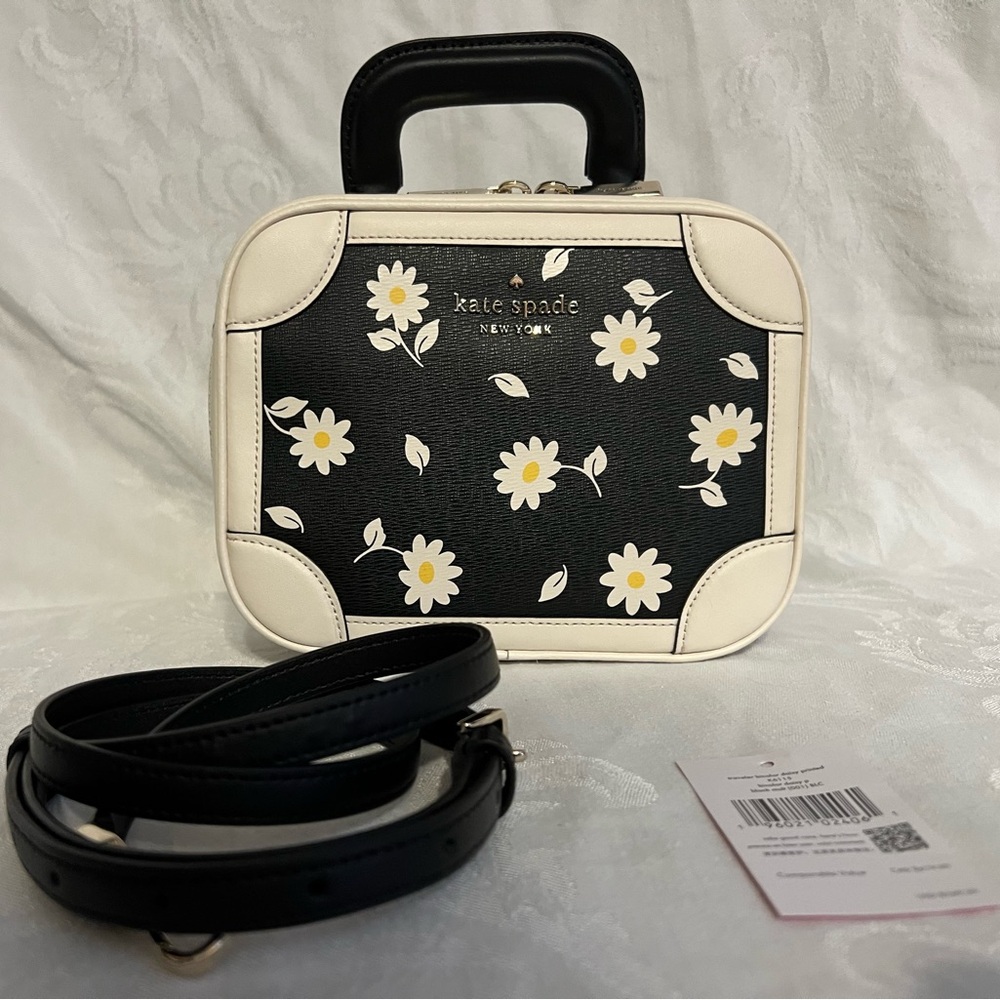 Kate Spade “Traveler” bicolored daisy printed tiny suitcase